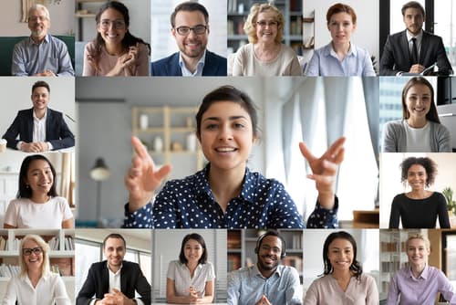 A grid of video-call participants in a group coaching session